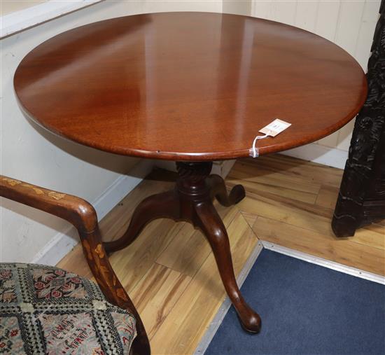 A George III mahogany birdcage tea table Diam.90cm